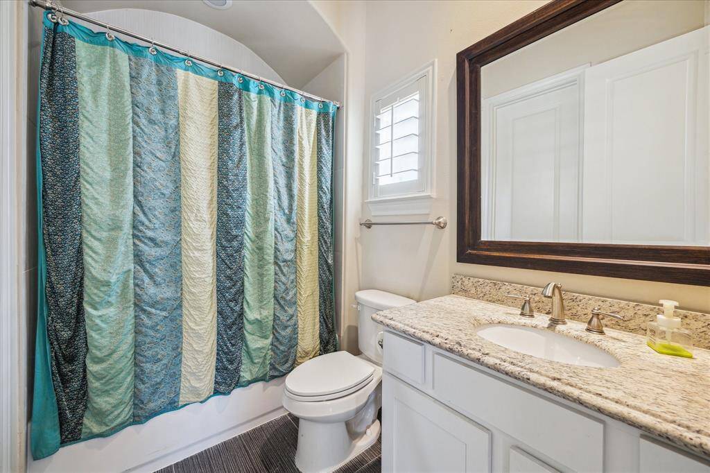 No suite is complete without a private Bath with custom cabinetry, granite vanity top and tub/shower combination.