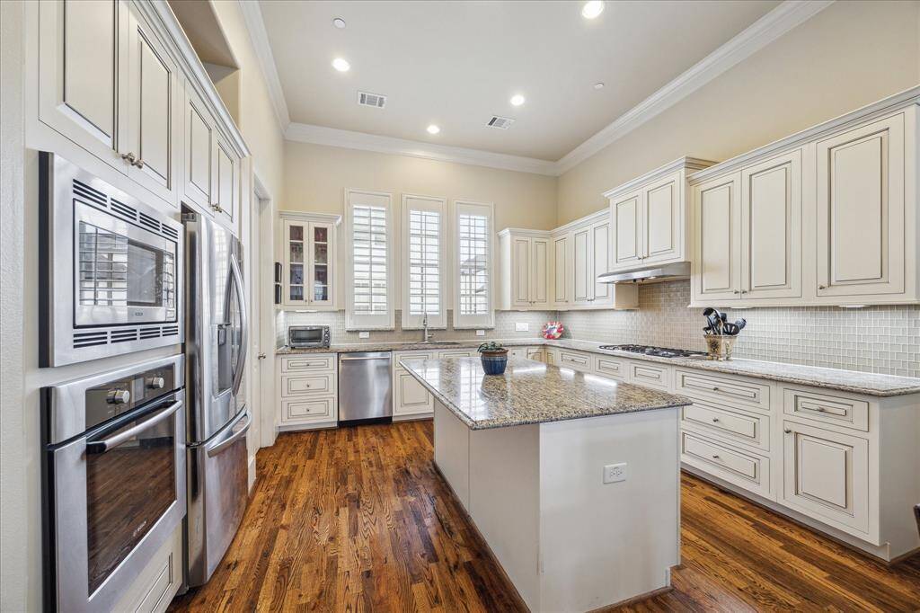 To the Second Floor...The Kitchen is sunny, beautiful and functional.