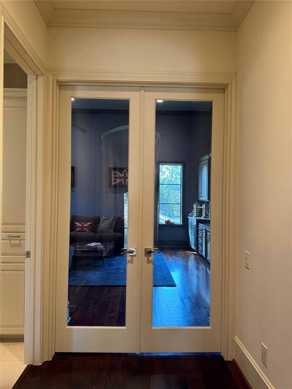 Double Glass doors close off the Gameroom upstairs.