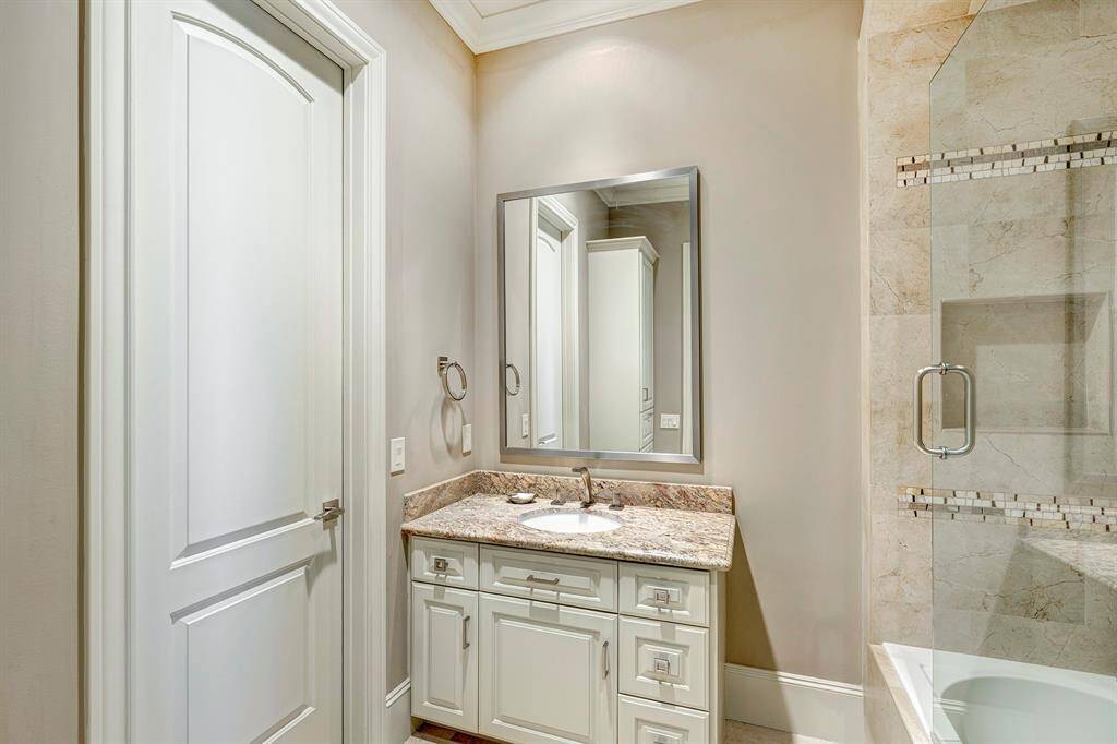 Tub shower combo for bunk bedroom, has laundry hamper
