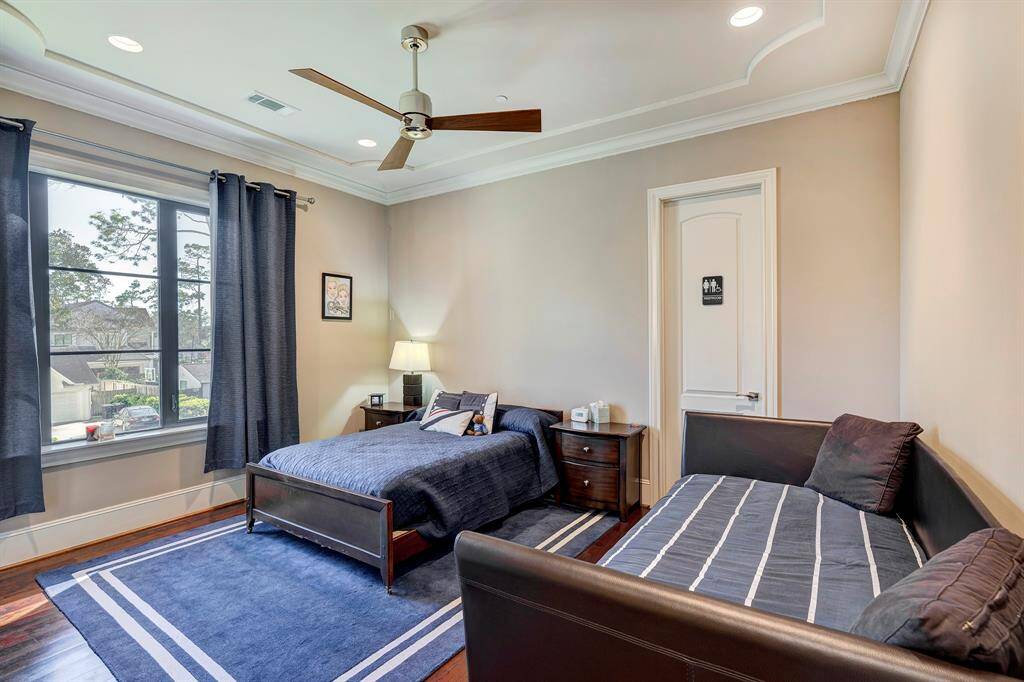 Door to bathroom also is available to game room. Walk in Closet. Drapes stay.