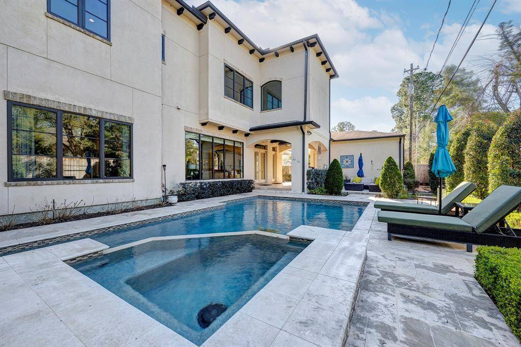Jump in! Summer is almost here; outdoor shower by sitting area
