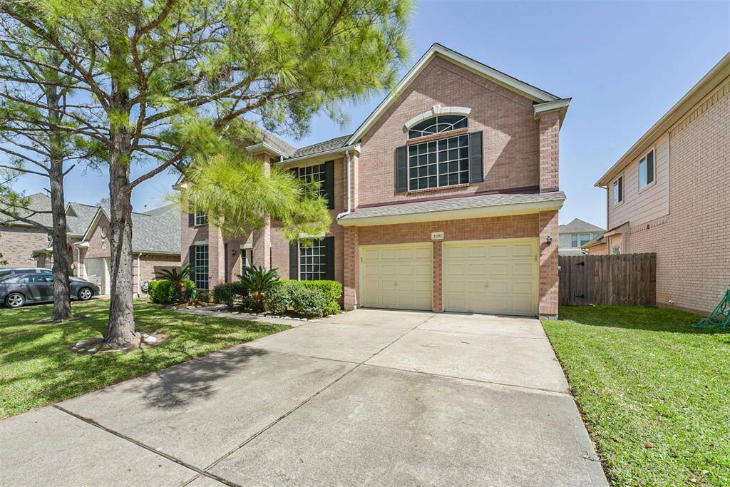 Ample parking space with automatic 2-car garage doors, a long driveway, AND street parking!