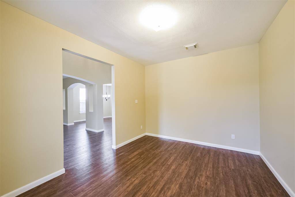 Office Space with window light located in the front of the home.