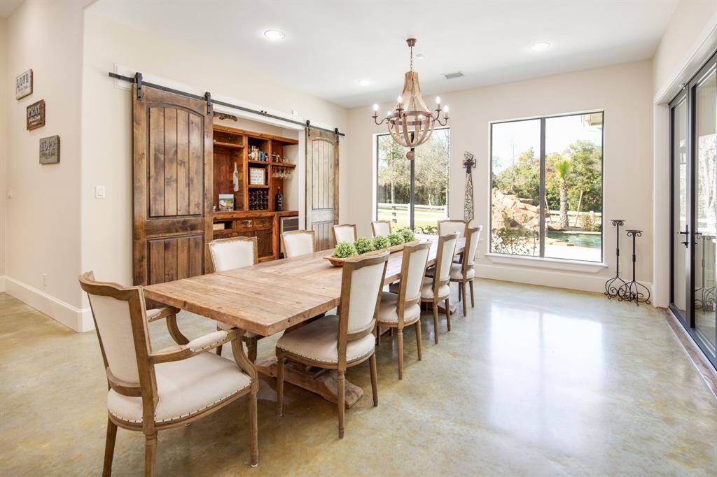 Off the dining room, you will find a custom wine room.