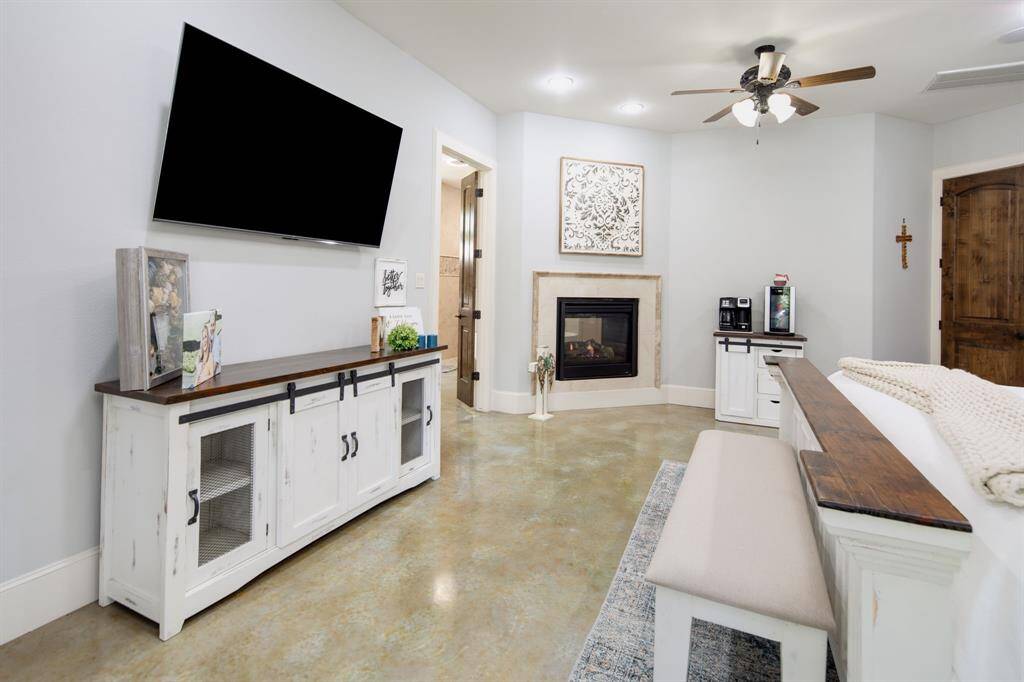 The double sided fireplace creates the perfect relaxing atmosphere.