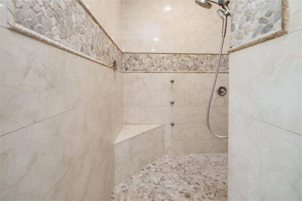 A closer look at the exceptional walk-through shower. Beautiful! Our clients have nicknamed it "the carwash".