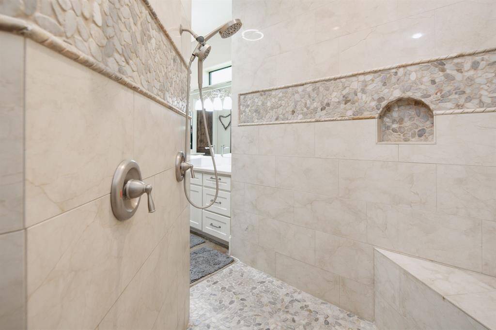 Multiple shower heads create a truly exceptional shower experience.