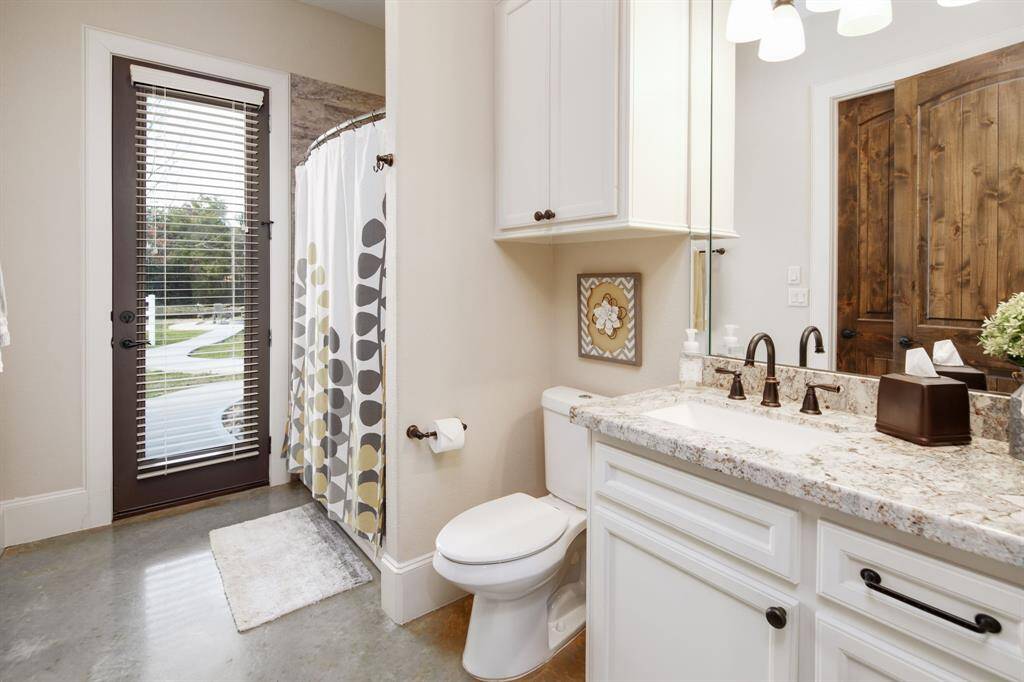Bathroom #2 that conveniently connects to the outside, so it can easily serve as a pool bathroom.