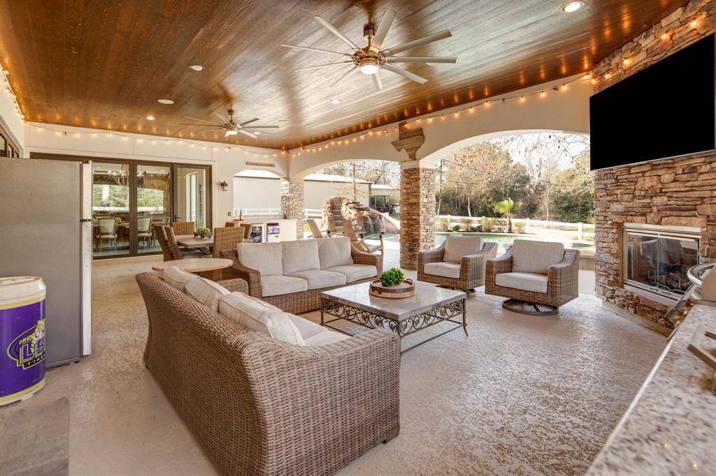 View from under the covered patio of the sparkling pool!
