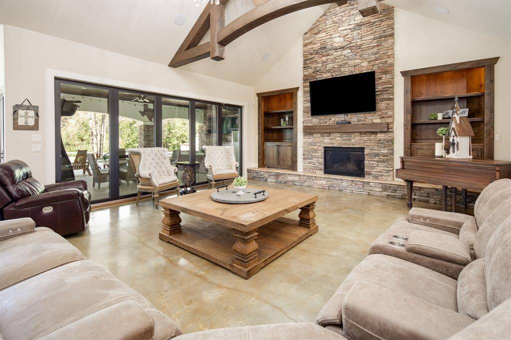 Step inside to the soaring vaulted ceilings complete with wood look beams.