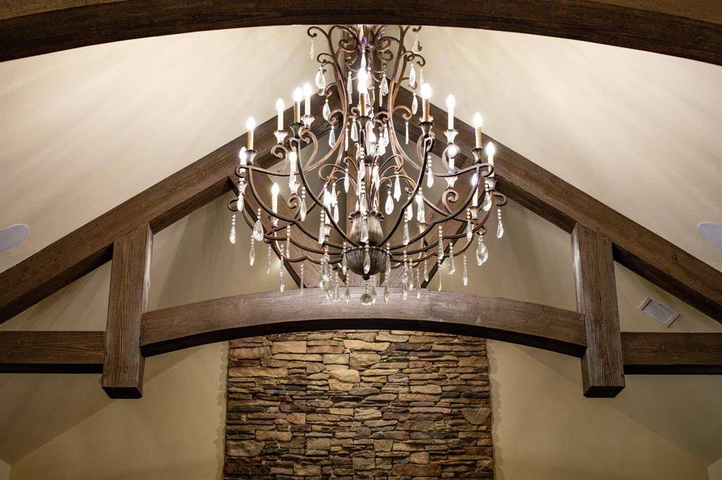 Custom built & lovingly curated with beautiful fixtures throughout - the chandelier in the living room being just one of many!