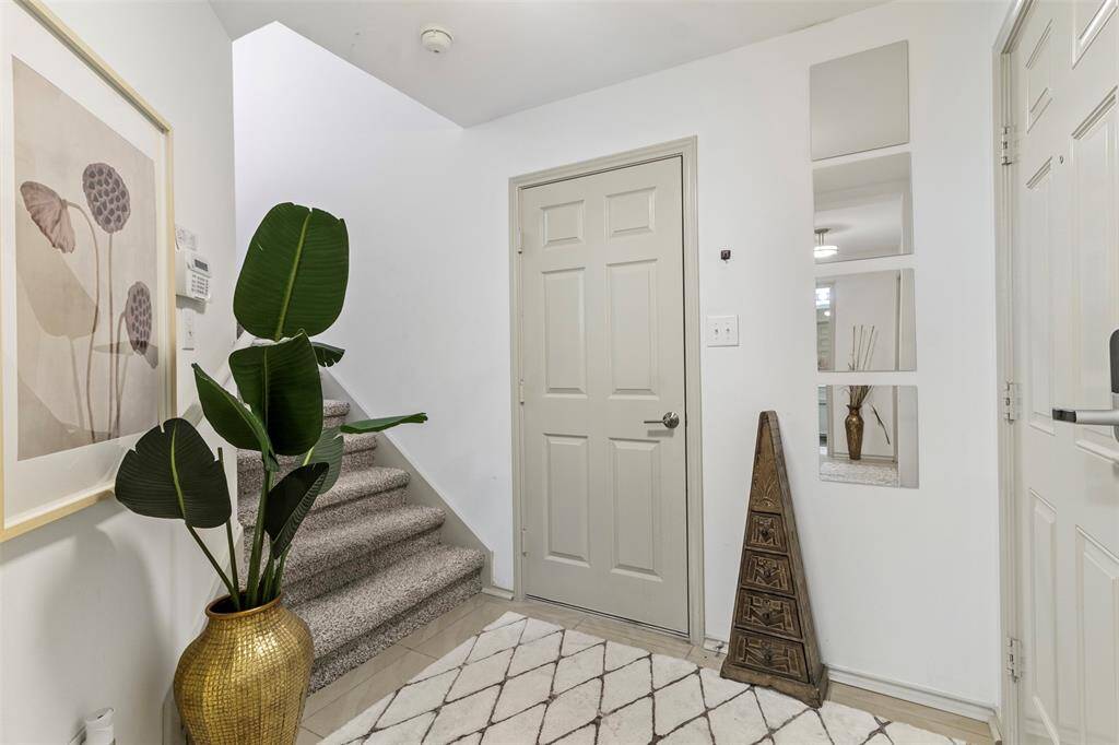 Warm and inviting foyer greets you off of the front and garage entrances