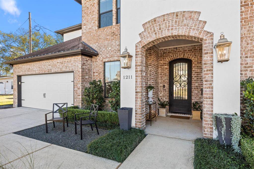 Welcoming covered front porch and front seating area.