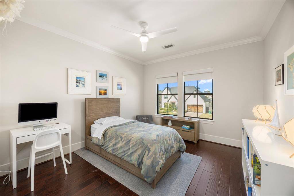 One of the two bedrooms that share a jack-and-jill style bathroom.