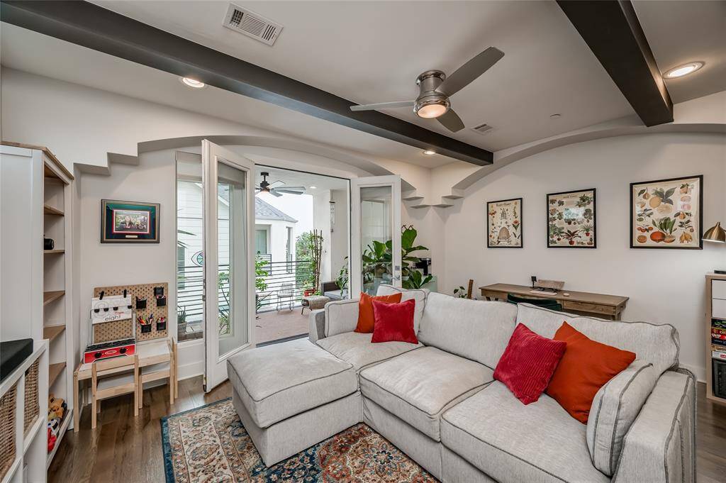 Multiple living areas each opening to outdoor space.