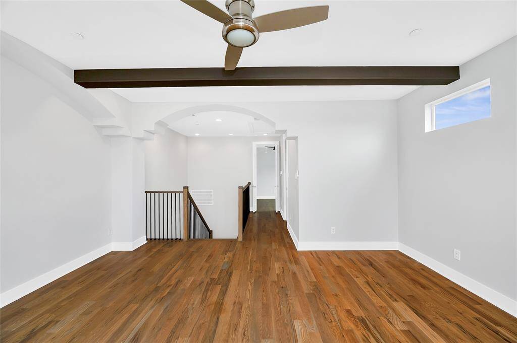 The bedroom is down the hall from this open living area. Perfect for guests who want to stay a while.