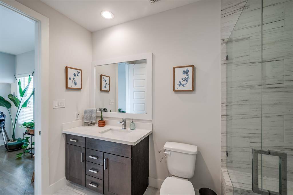 The 4th floor en suite bath has 2 entrances so guests can access it via the additional living area.