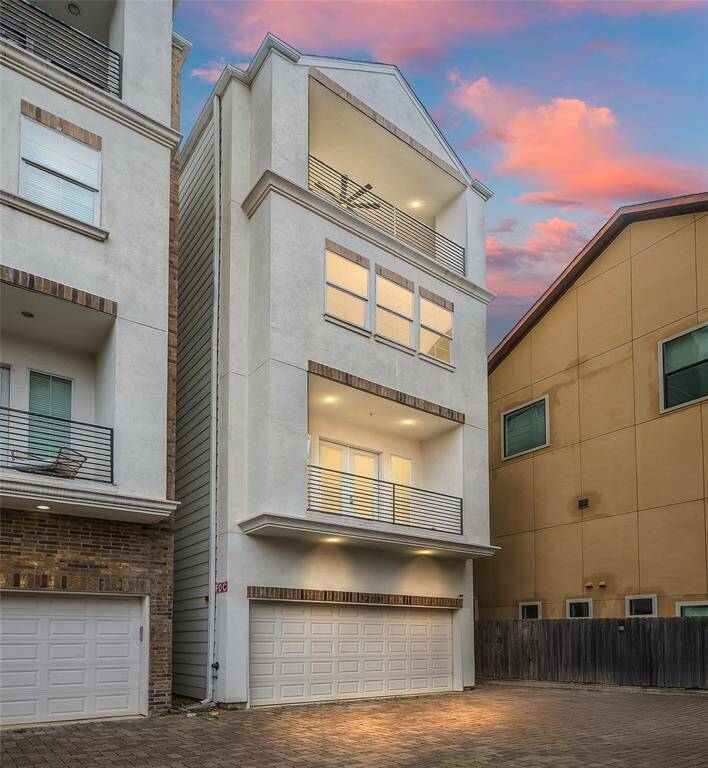 One of four homes on a private drive, you'll find this home at the very end with extra parking in front of the 2 car garage.