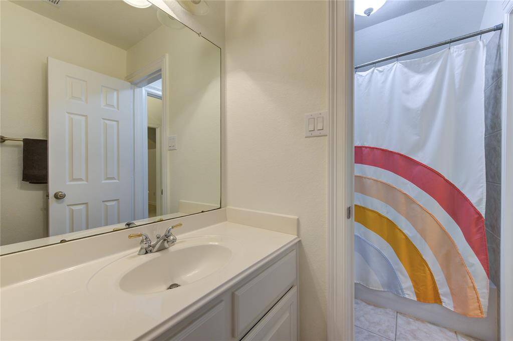 These bathrooms are in immaculate condition, ensuring a move-in-ready experience for family and guests alike.