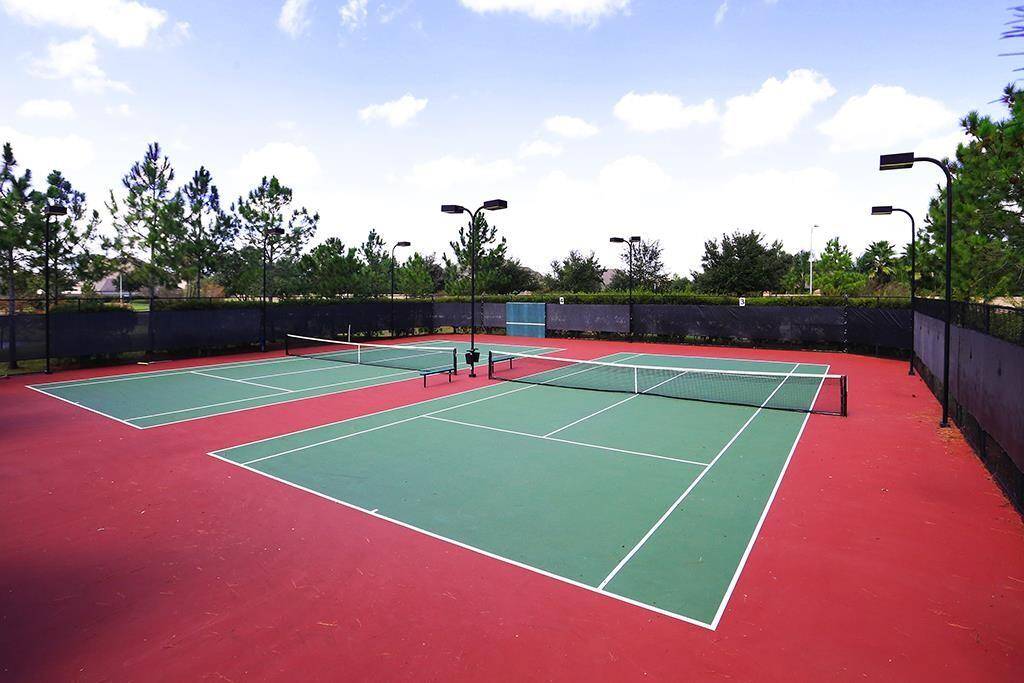 For those seeking recreation, the community boasts tennis courts, ideal for friendly matches or lessons, as well as a sparkling swimming pool for cooling off on hot days. T