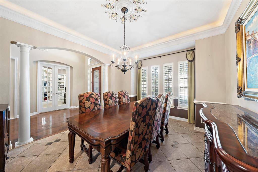 Ideally located right off the kitchen and foyer, the formal dining area offers generous room for a large table and multiple seating options—ideal for everyday meals and special occasions.