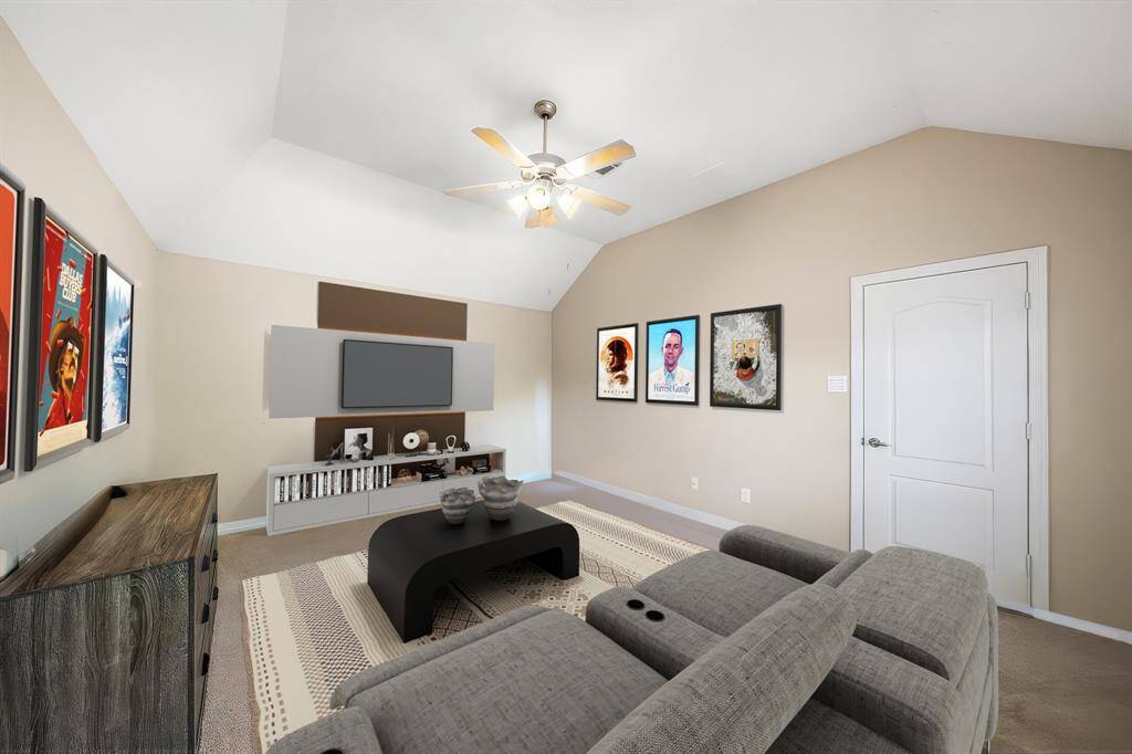 Perfect for entertaining, the flex room is shown here as a media room, offering a stylish and functional setup ideal for movie nights and casual gatherings. This photo has been virtually staged.