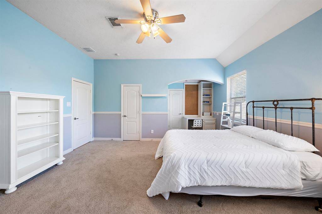 This secondary bedroom comes with limitless possibilities for various setups, all enhanced by a built-in study area and its own ensuite bath.