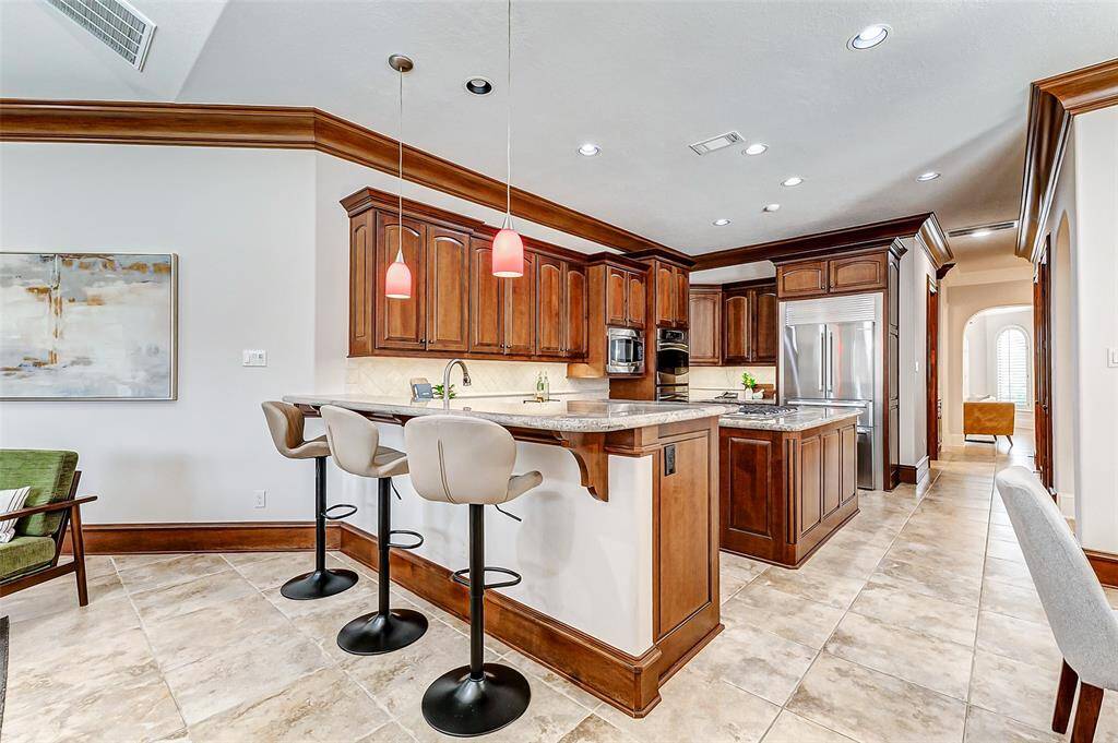 This home offers ceiling fans in all bedrooms, media, living, and family rooms for year-round comfort. Enjoy stereo pre-wiring in the dining, media rooms, and back patio, plus full CAT5 wiring for seamless connectivity.
