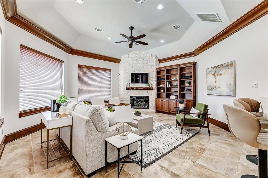 Enjoy the family room tucked away in the back of the house with windows to enjoy the tranquil back yard