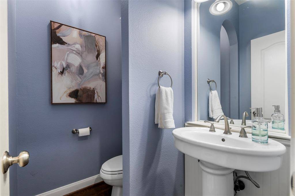 Spacious half bath for guests.