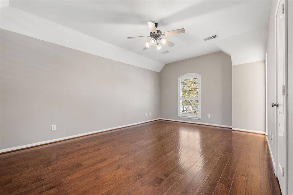 Bedroom three.  All of these secondary bedrooms are a good size with great walk-in closets.