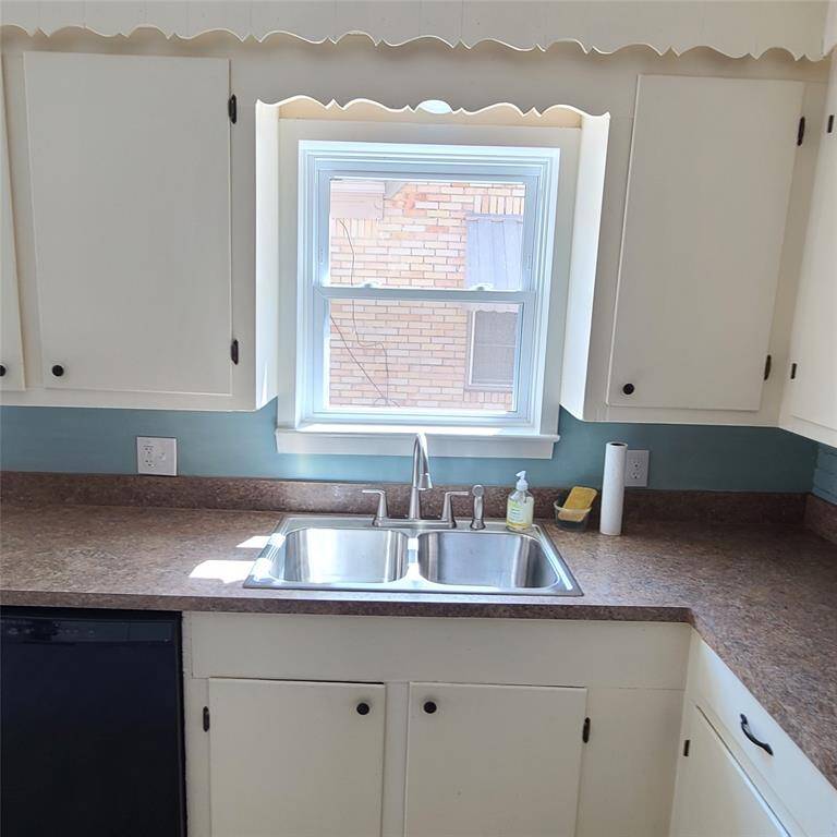 stainless steel sink with lots of light