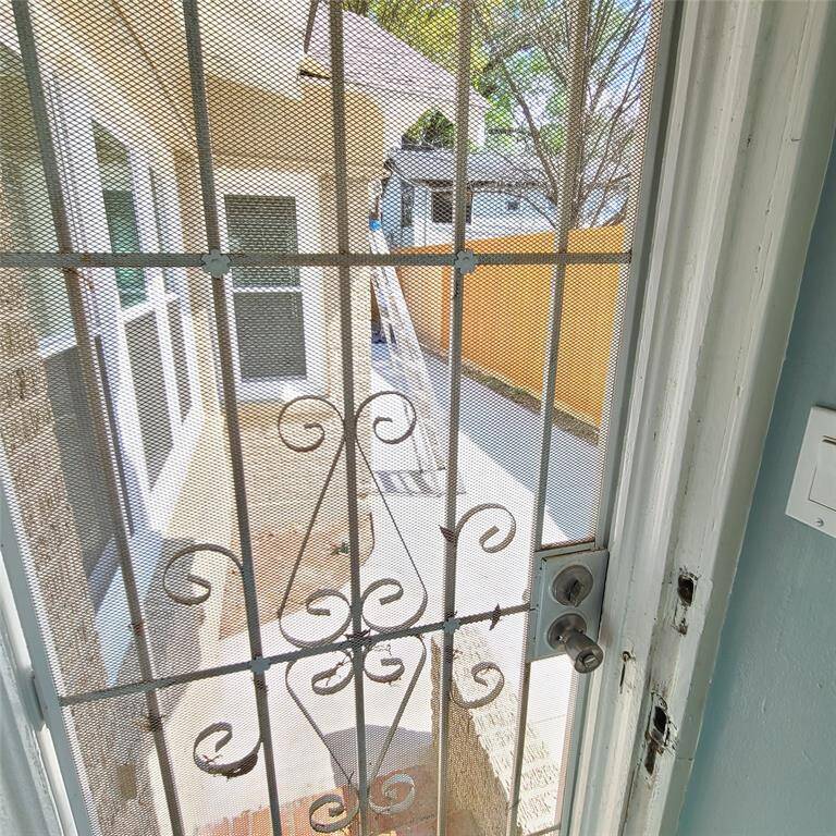 kitchen door leading to side driveway. You can unload your groceries up close!