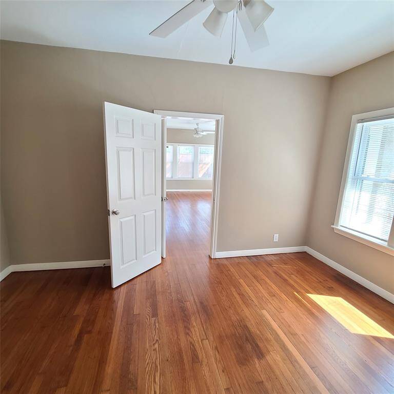 second bedroom/study, looking into primary bedroom