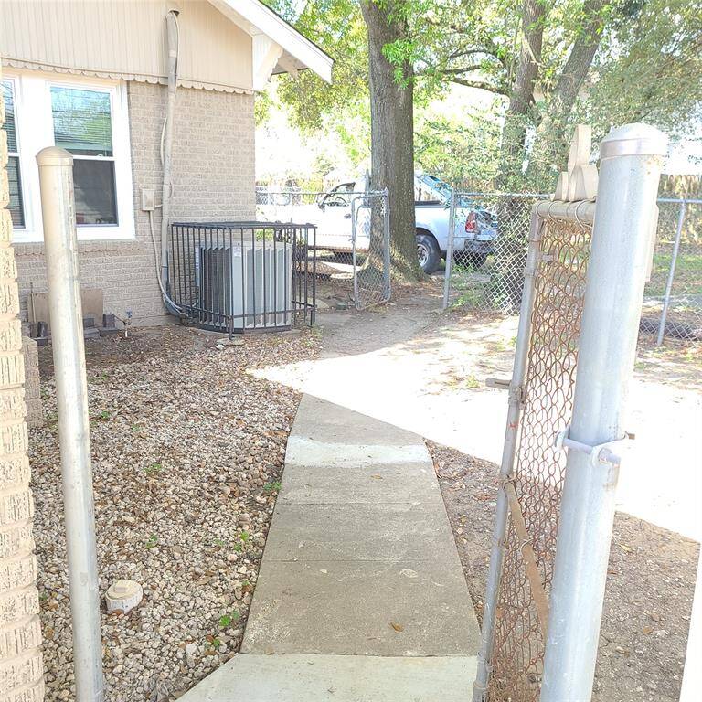 side yard, next to driveway