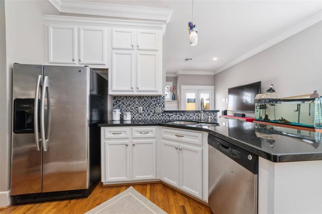 The Maytag refrigerator is included with the home.