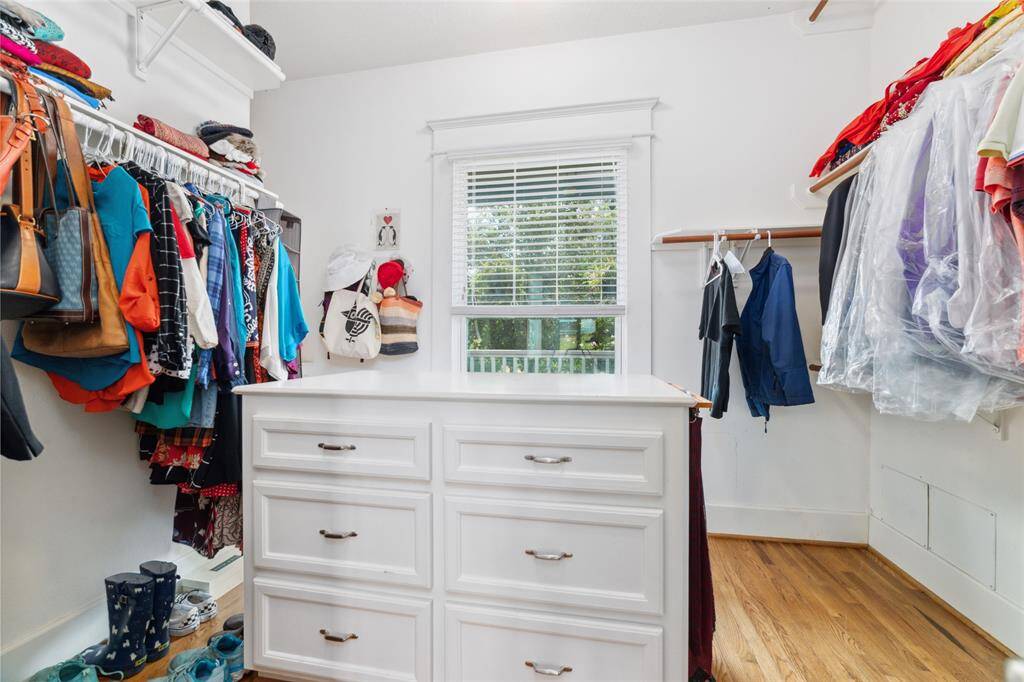 The primary suite features a fantastic walk-in closet, with additional storage just around the corner to the left. Come by for a tour and see it all firsthand.