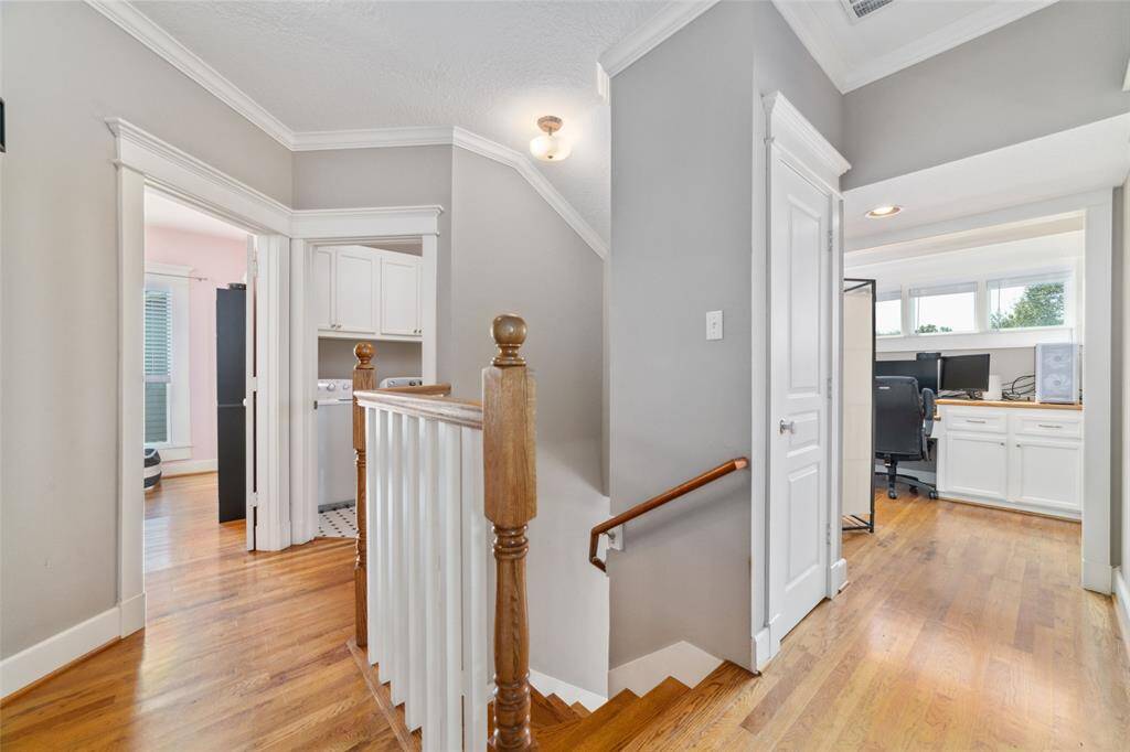 Upstairs, you'll find two bedrooms, a Hollywood bath, an office nook, laundry room, family/game/media room, and shhhh... a Secret Room.