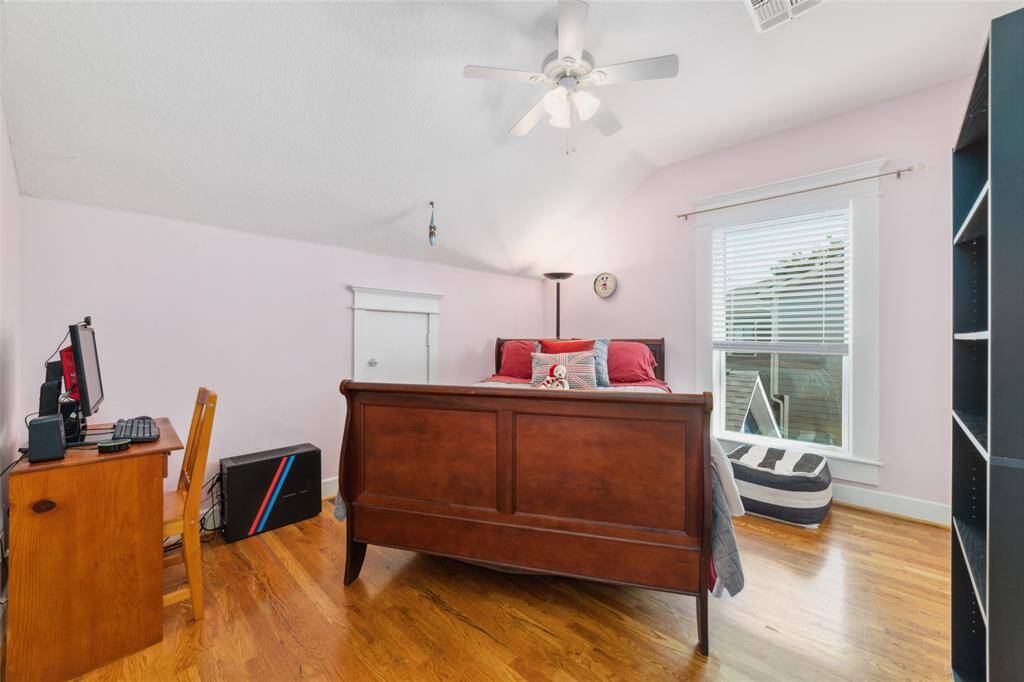 Bedroom Two features a spacious walk-in closet and one of three walk-in attic storage spaces.