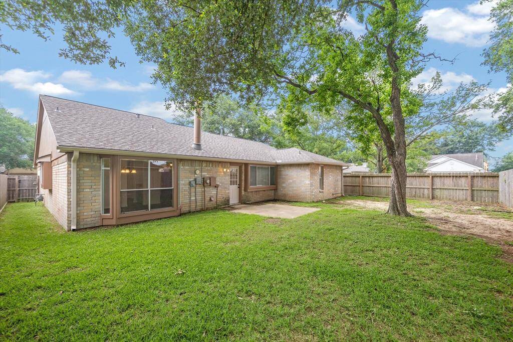 Enjoy plenty of fresh air and sunshine with this sprawling fenced yard with patio.