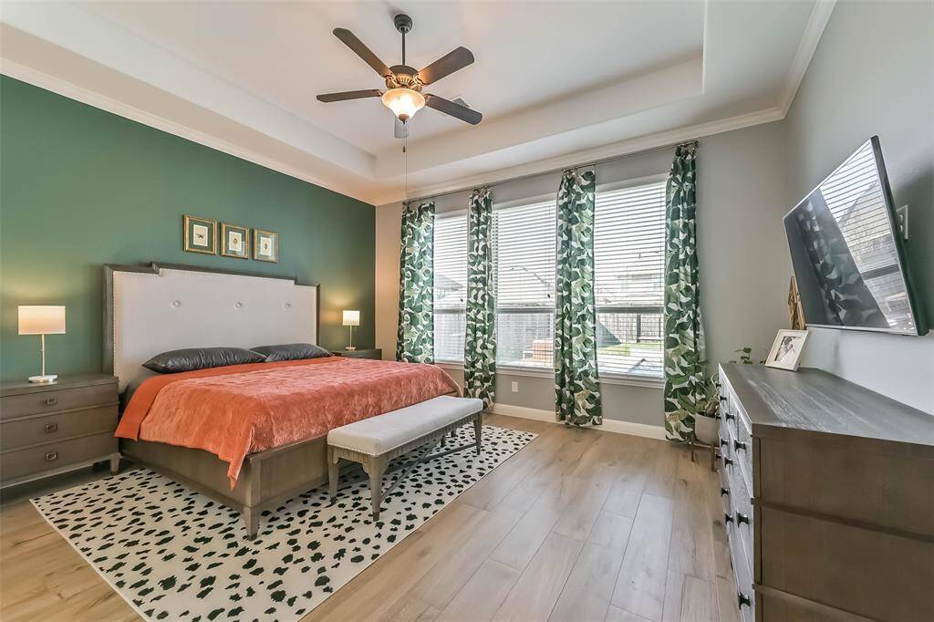 Primary bedroom, beautiful ceiling with lots of natural light.