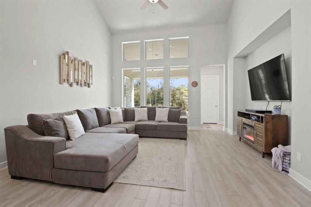 Large living area and large windows let in an abundance of light.