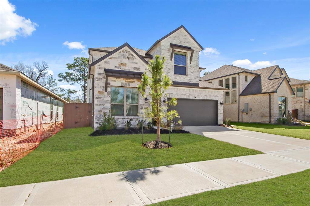 Beautiful elevation with earth tone front.