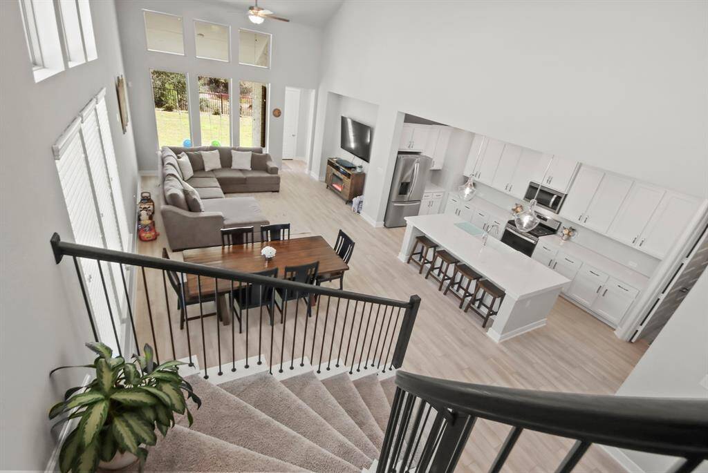 Beautiful winding staircase that overlooks the first-floor common space.