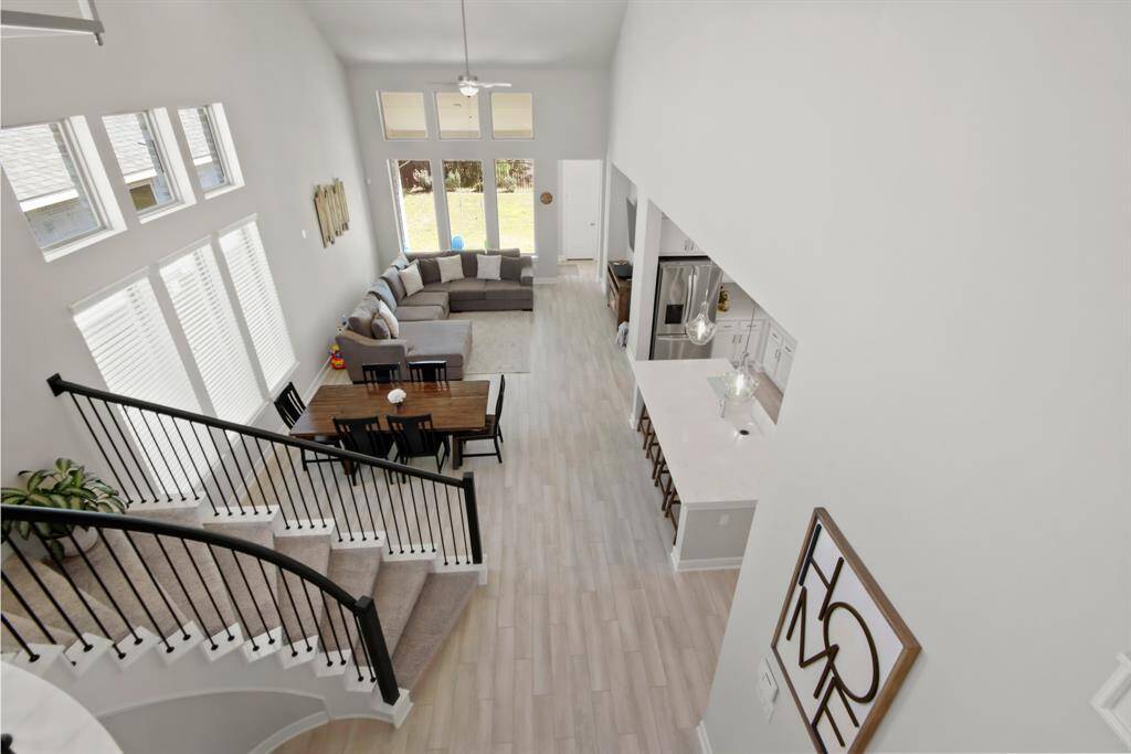 Entertaining is a must with this open concept plan and has tall ceilings throughout.