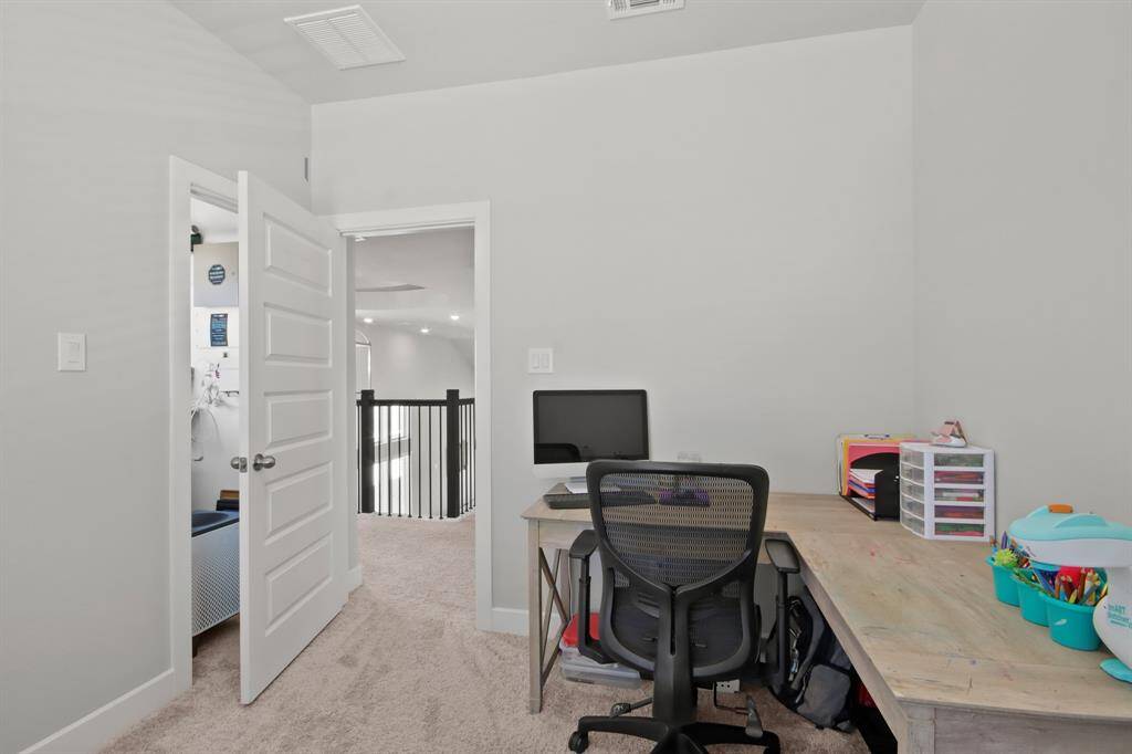 Off the stairway you will see media room/bedroom with a large closet.