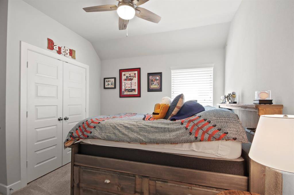 Bedroom has large closet and window for natual lighting.