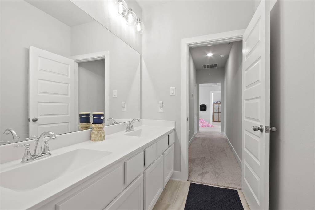 Bathroom three leads to hallway to support all rooms on floor two.
