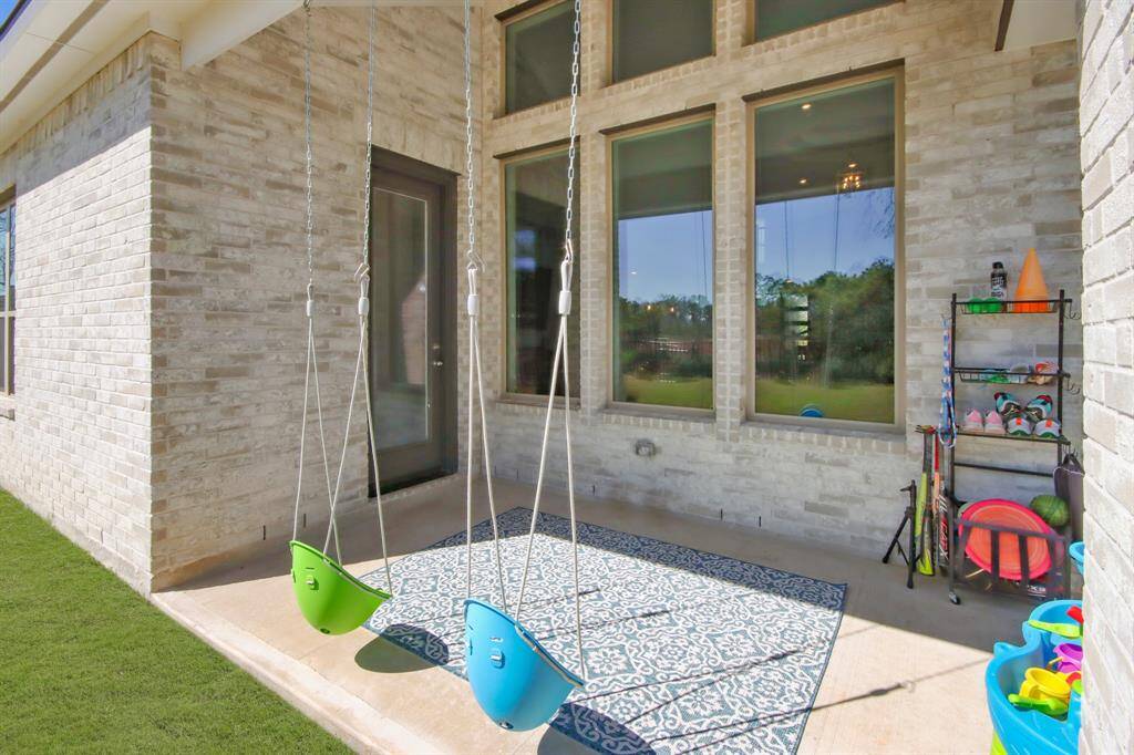 Enjoy your beautiful green spaced under your covered patio.